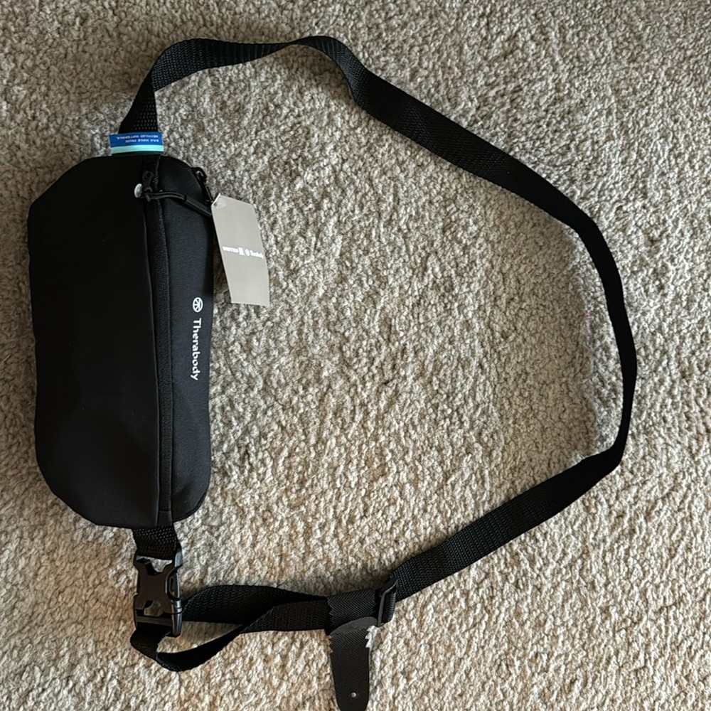 Therabody crossbody bag from United airline business class